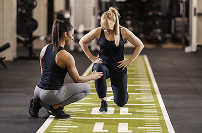 Personal training session at the gym.