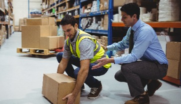 workers lifting boxes