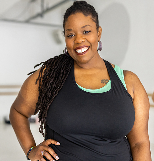 Happy woman in the fitness center.