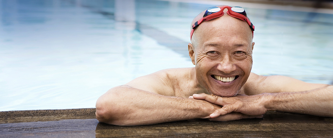 Happy man in the pool.